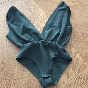 Green plunge neck body suit